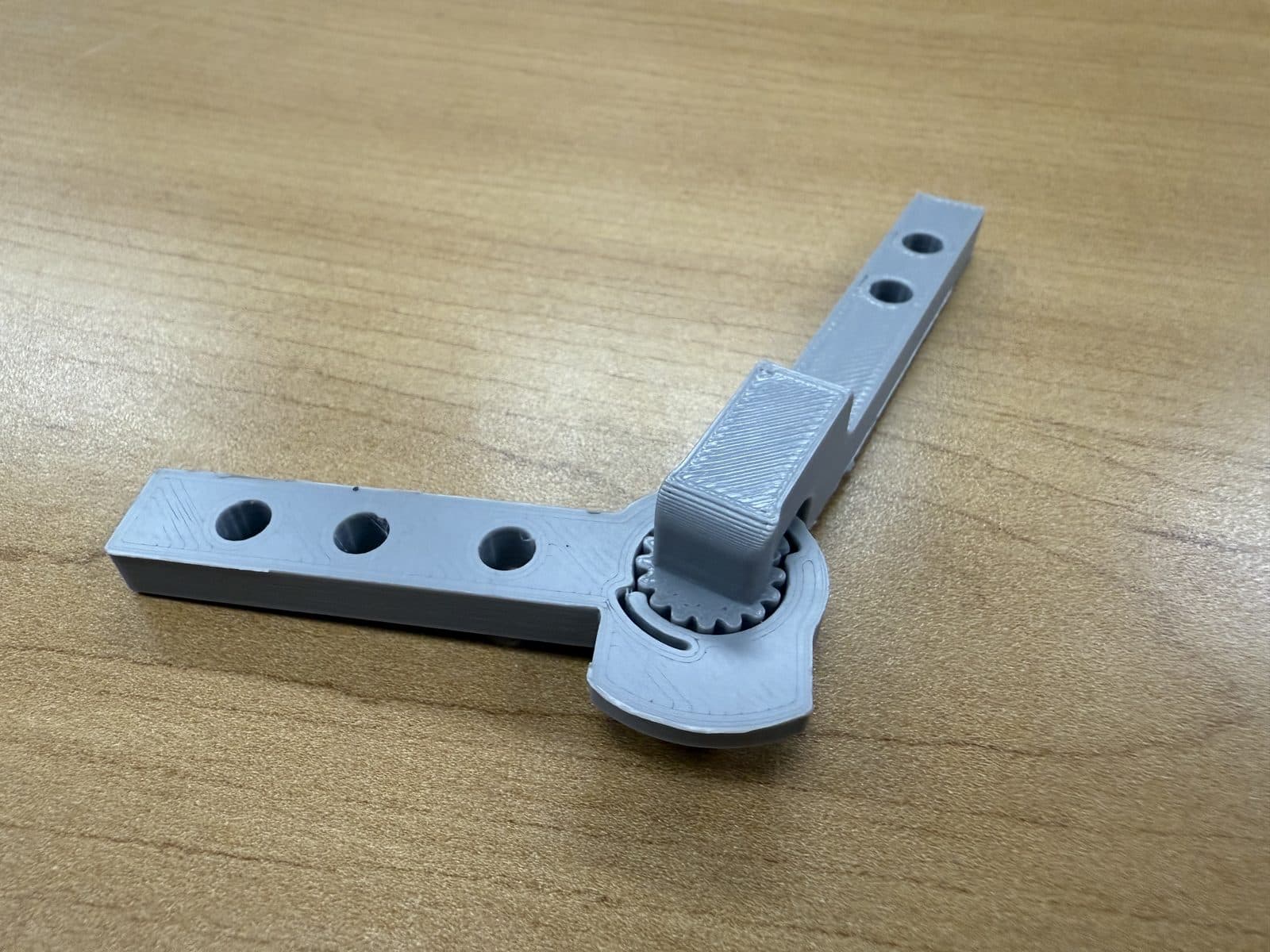 An early printed ratchet joint, before it was sized to the arm.